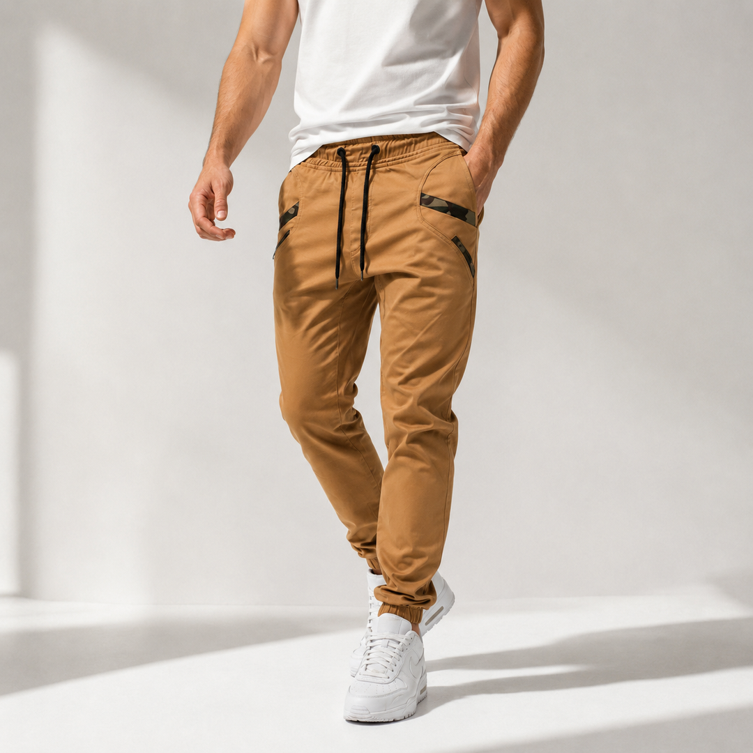 Khaki jogger pants for men shown in a casual lifestyle view with slim tapered styling and visible pocket details in full view