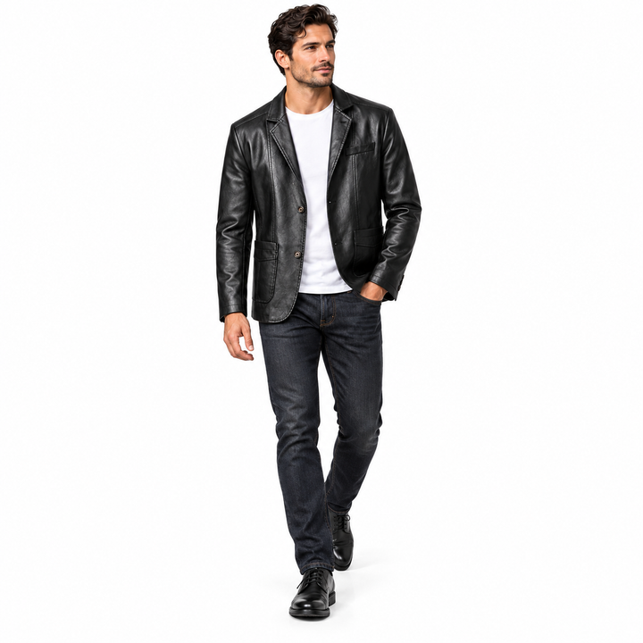 Male model walking in the black PU jacket with a plain white T-shirt and dark jeans, photographed on white studio background.