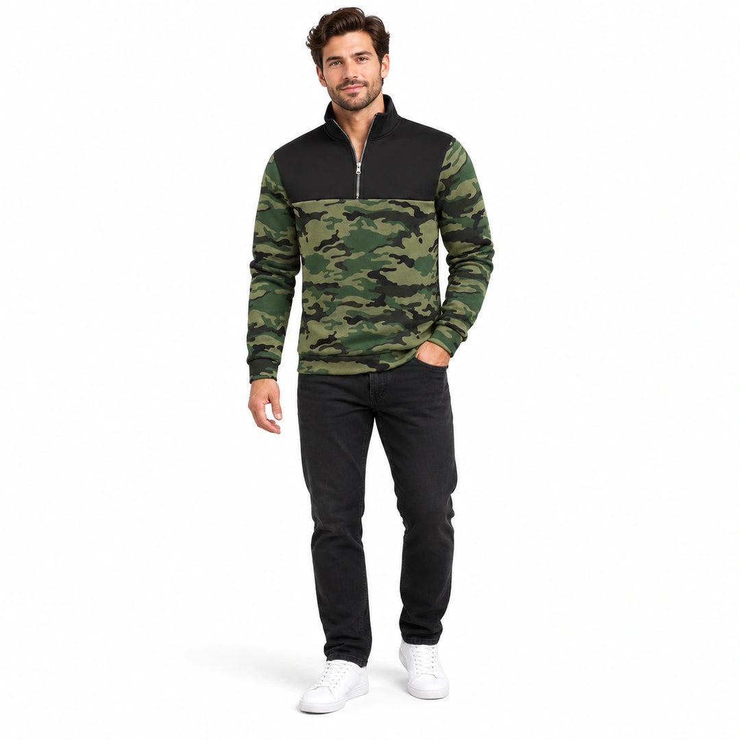 Men's green camouflage quarter zip pullover with black upper chest and collar worn by a model