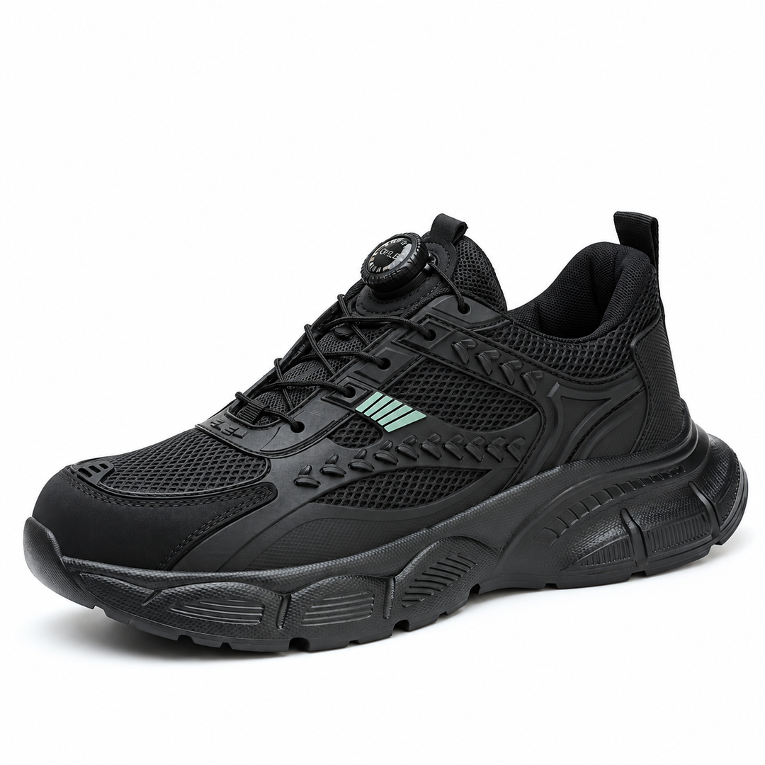 Black model 9233 shoe in a reference-based three-quarter view showing mesh panels, green accents and sculpted sole in studio.