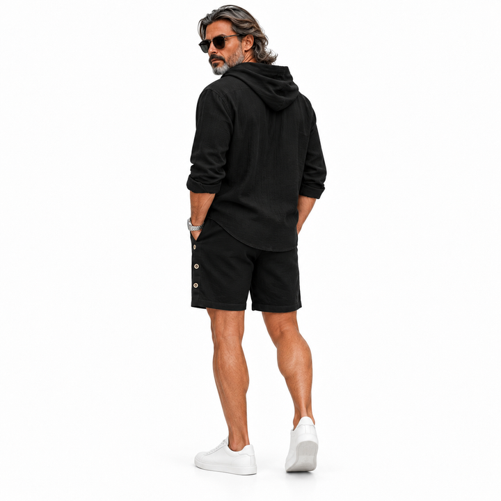 Black hooded shirt and shorts set shown from the back on white background