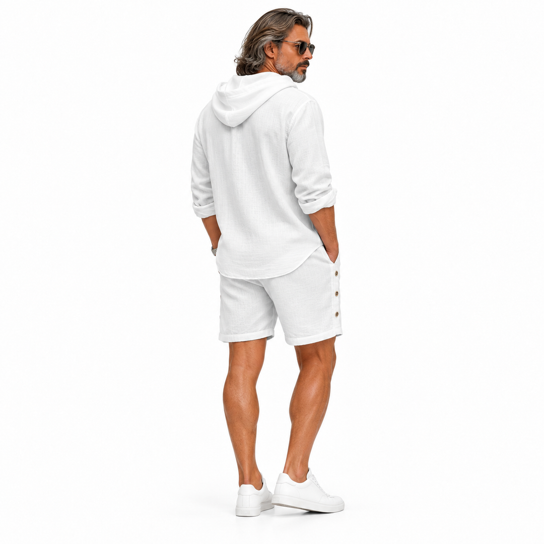 White hooded shirt and shorts set shown from the back on white background