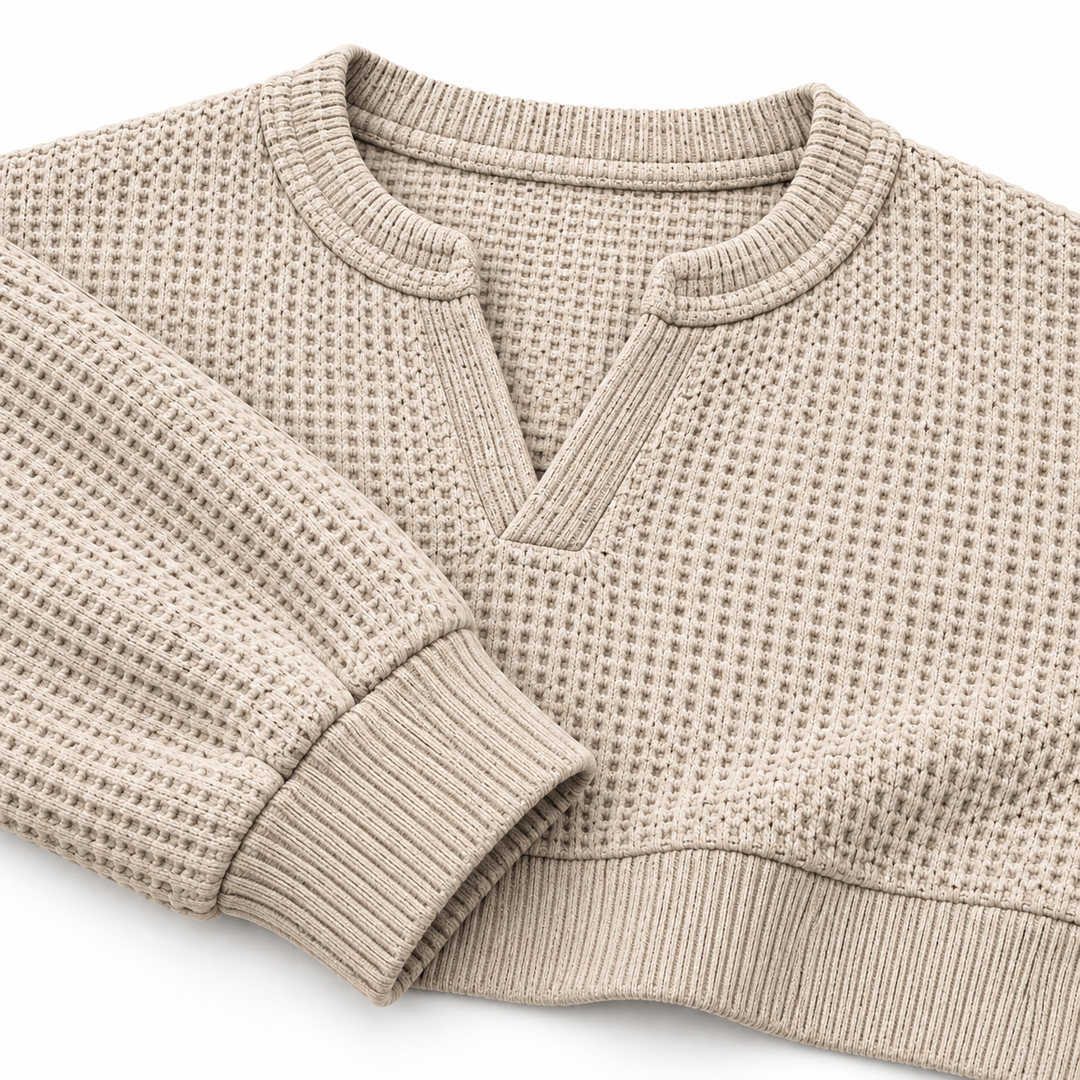 Beige waffle shirt close-up showing neckline cuff and ribbed hem details