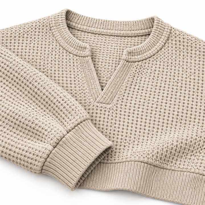 Beige waffle shirt close-up showing neckline cuff and ribbed hem details