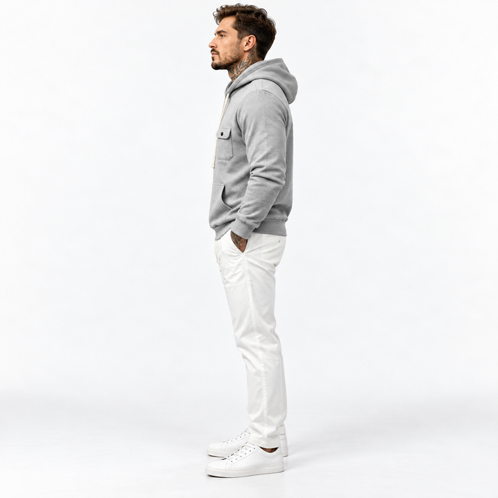Light gray hooded pullover shown from the side with long sleeves and ribbed hem