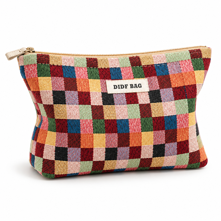 Medium Multicolor Plaid makeup bag shown closed in a front three-quarter studio view on white.