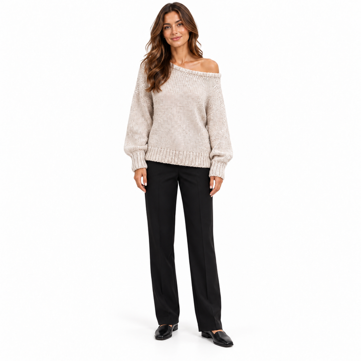 Photograph of off shoulder sweater in apricot, straight front view, showing the garment design, on a white studio background.