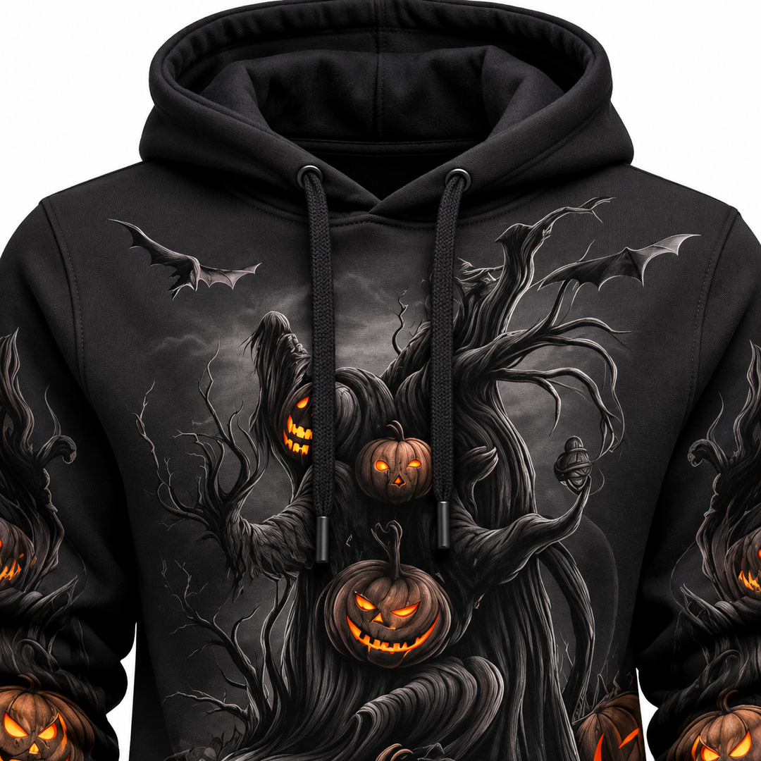 Close-up of orange haunted tree hoodie print, drawstrings and stitching