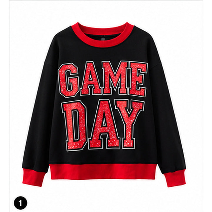 Oversized game day sweatshirt in black with red ribbed trim and distressed GAME DAY varsity graphic on a clean white background.
