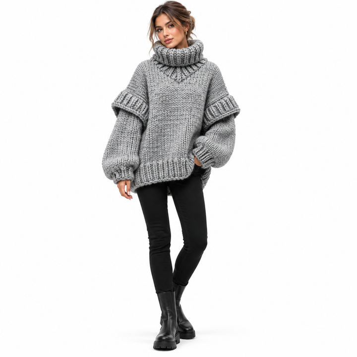 Oversized turtleneck sweater in gray chunky knit, full model front view