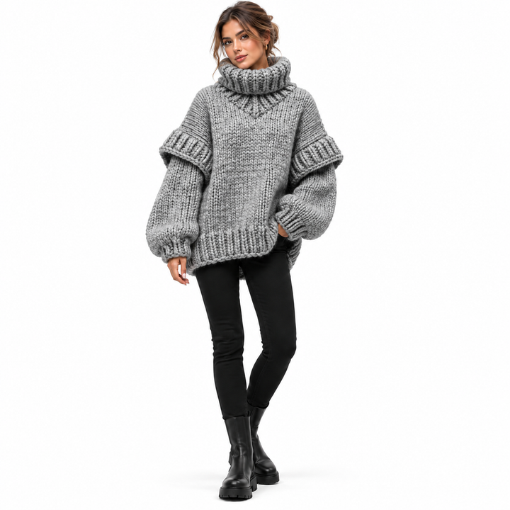 Gray oversized turtleneck sweater on model, relaxed studio front view