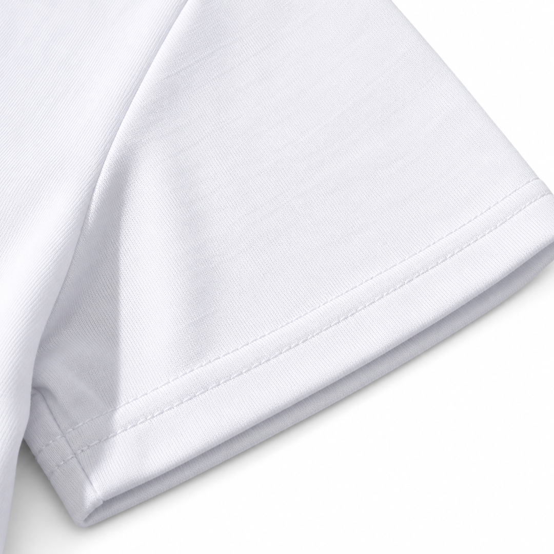 Close-up of white Paris T-shirt sleeve hem and stitching, showing fabric texture and precise construction on a clean backdrop