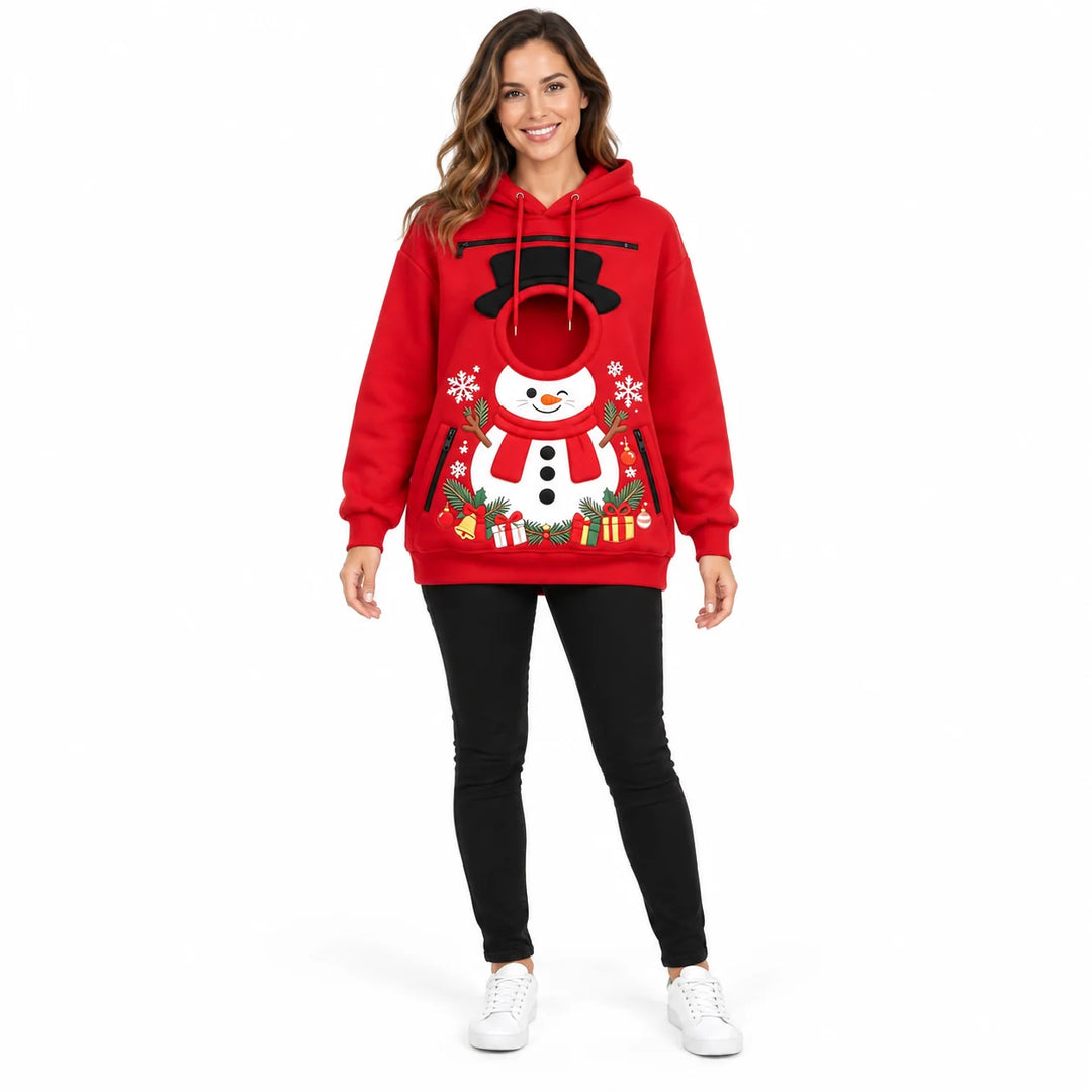 Full-body model wearing a red snowman pet pouch hoodie with long sleeves, circular front opening and Christmas gift graphics.