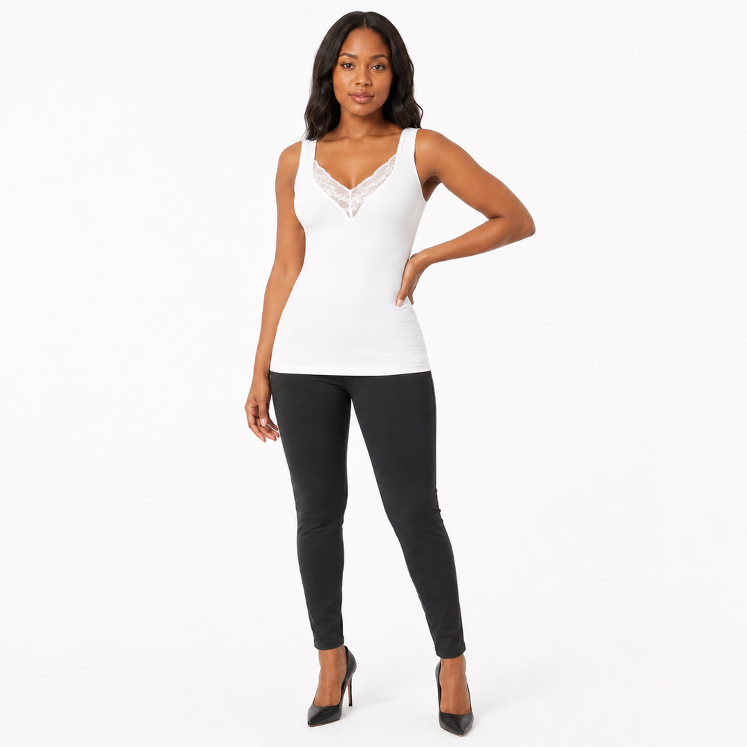 Plus size lace tank top for women in white showing a smooth flattering fit, wide straps and lace V-neck detail