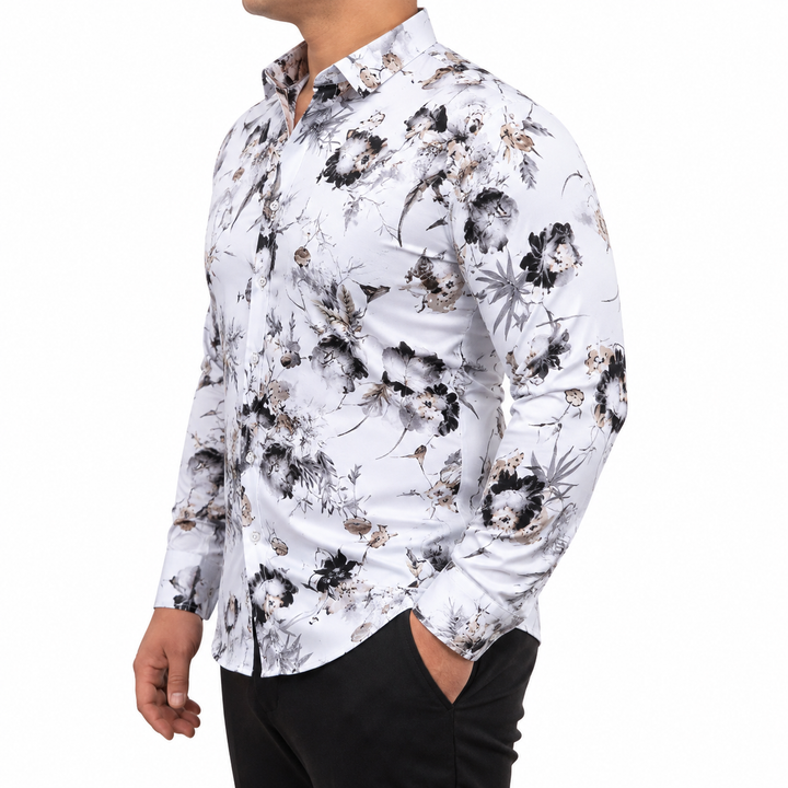 Male model, in white monochrome floral long sleeve button-up shirt shown in side view to present the verified fit appearance.