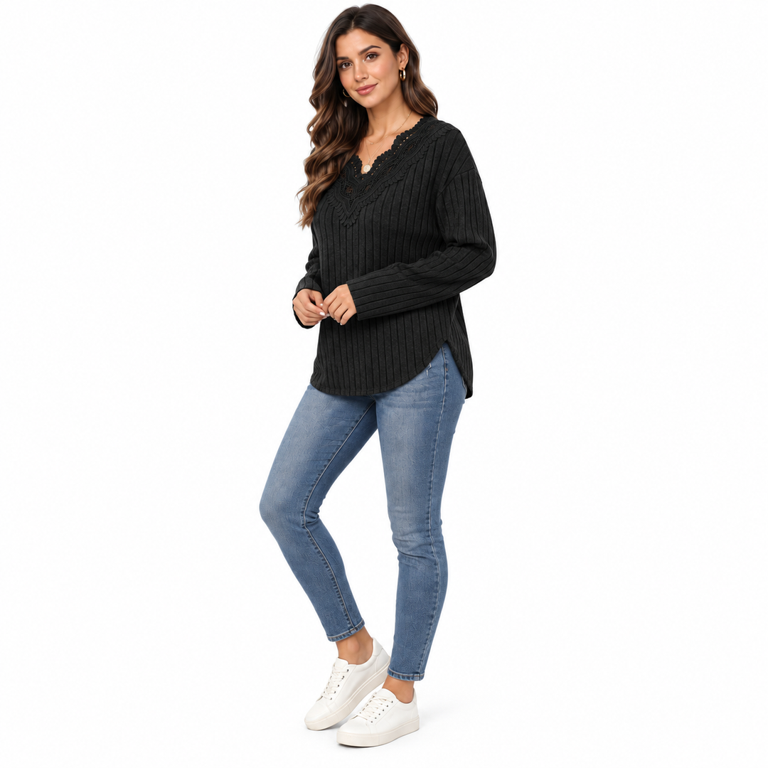 Black lace trim sweater in three-quarter view with jeans