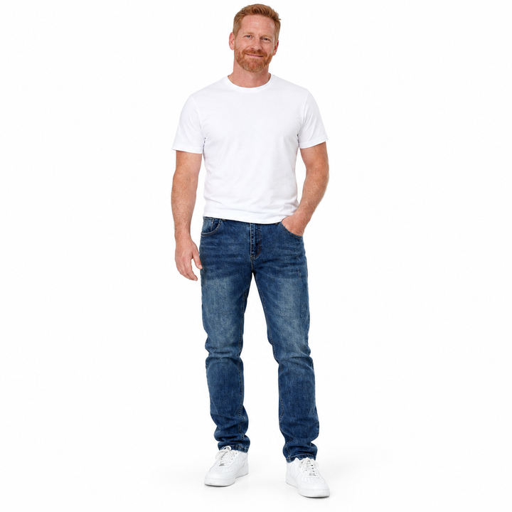 Blue jeans worn by a second male model on a white studio background