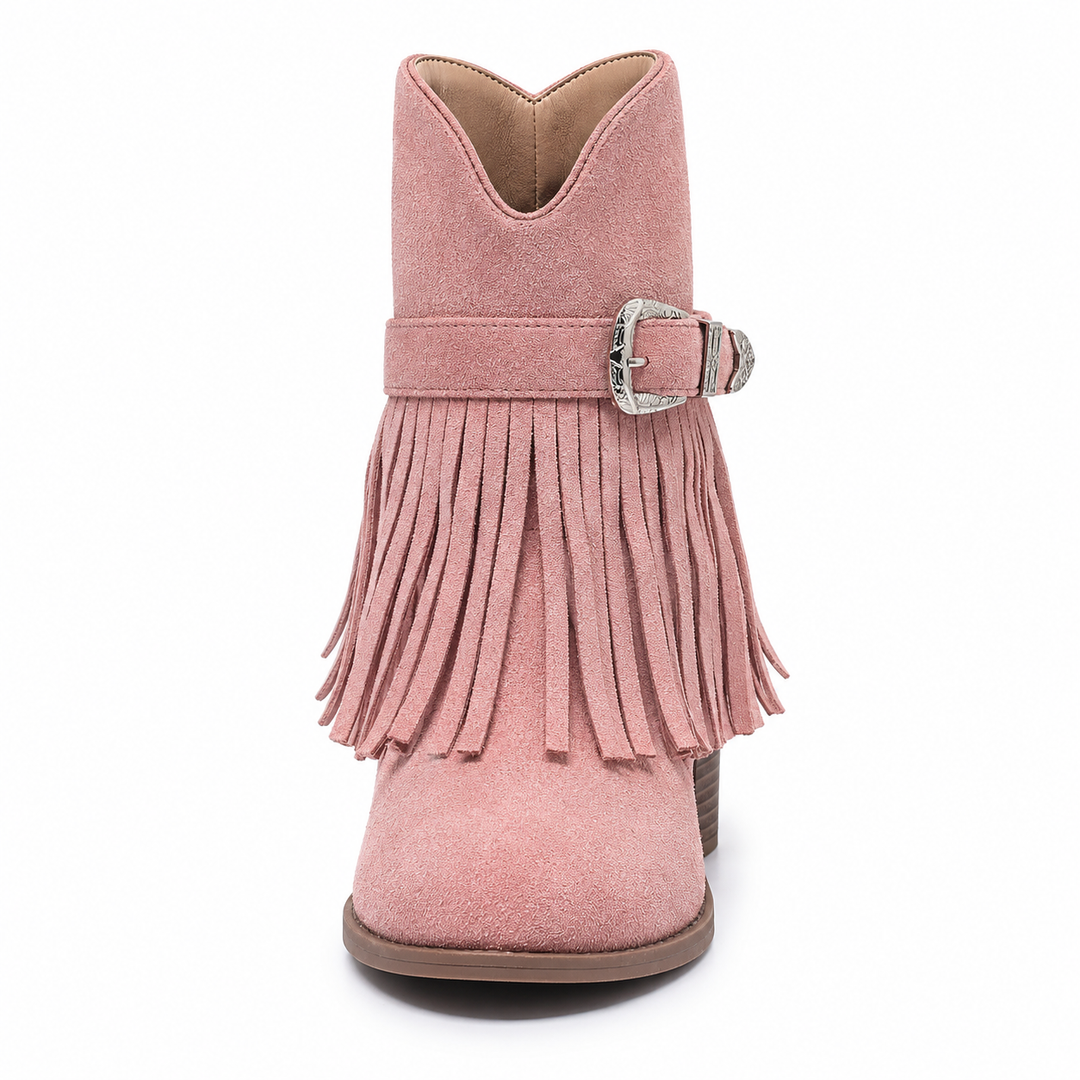 Front view of a pink fringe ankle boot with fringe strips, a rounded toe and silver hardware in a studio photograph on white.