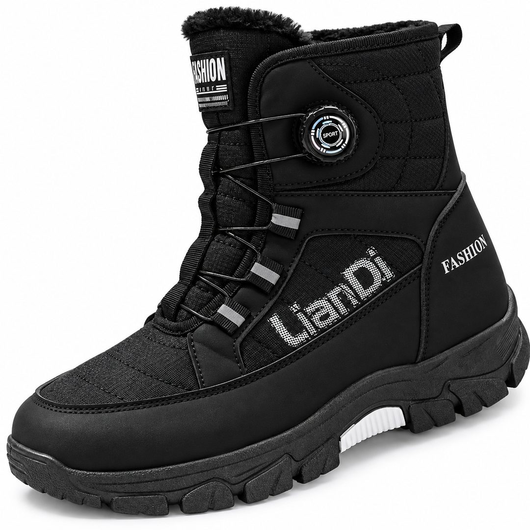 Close view of the black dial-fastened boot with a rotary dial, cable laces and a white sole insert in a white studio setting.