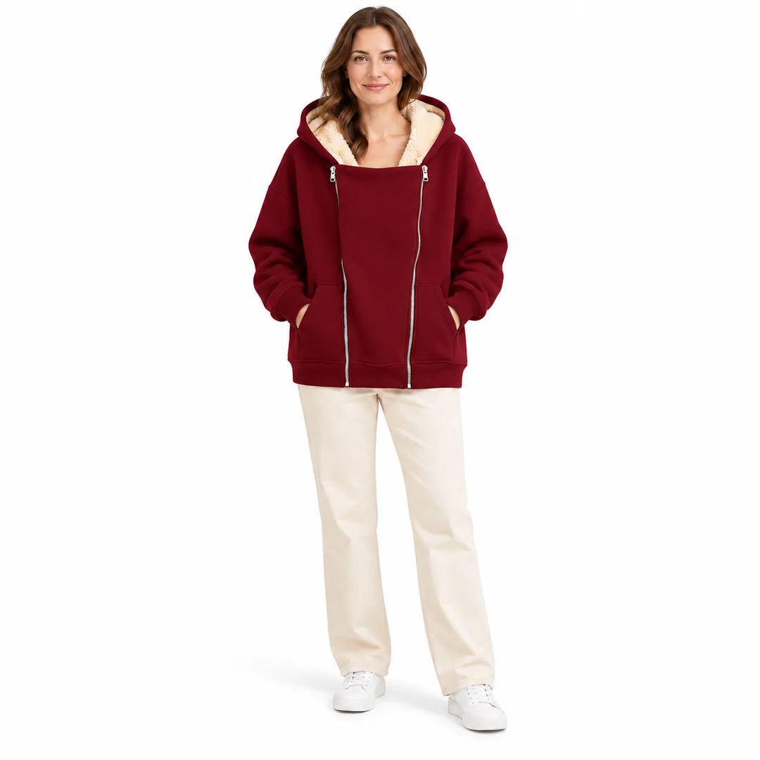 Burgundy Red hooded sweatshirt on a full-body model, with cream hood lining, a broad front panel and silver zippers on white.