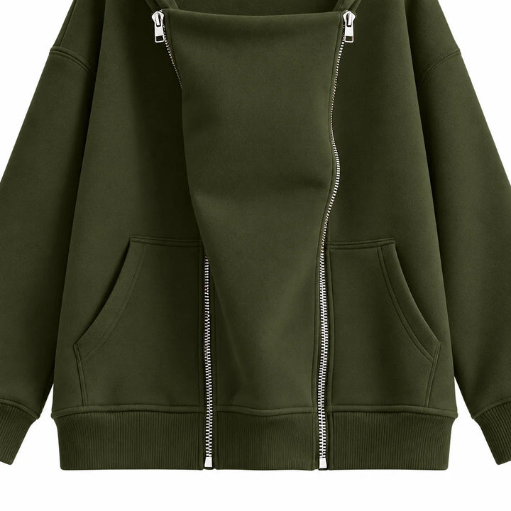 Army Green sweatshirt detail showing the broad front panel, twin silver zippers, angled pockets, ribbed hem and sleeve cuffs.