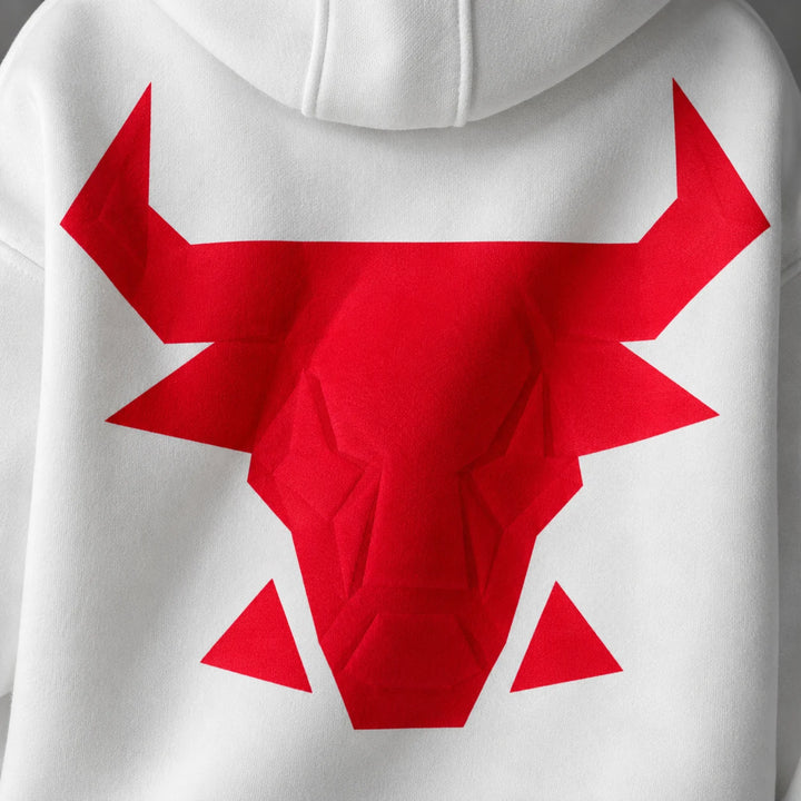 Detailed view of the red angular bull head graphic printed on white fabric across the back of the hooded pullover sweatshirt.