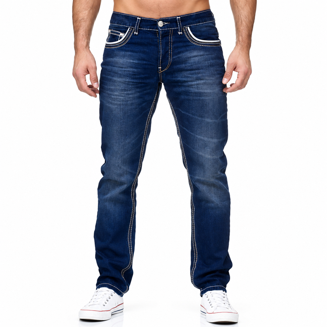 Front detail of Dark Blue jeans showing contrast pocket outlines, fly and seams