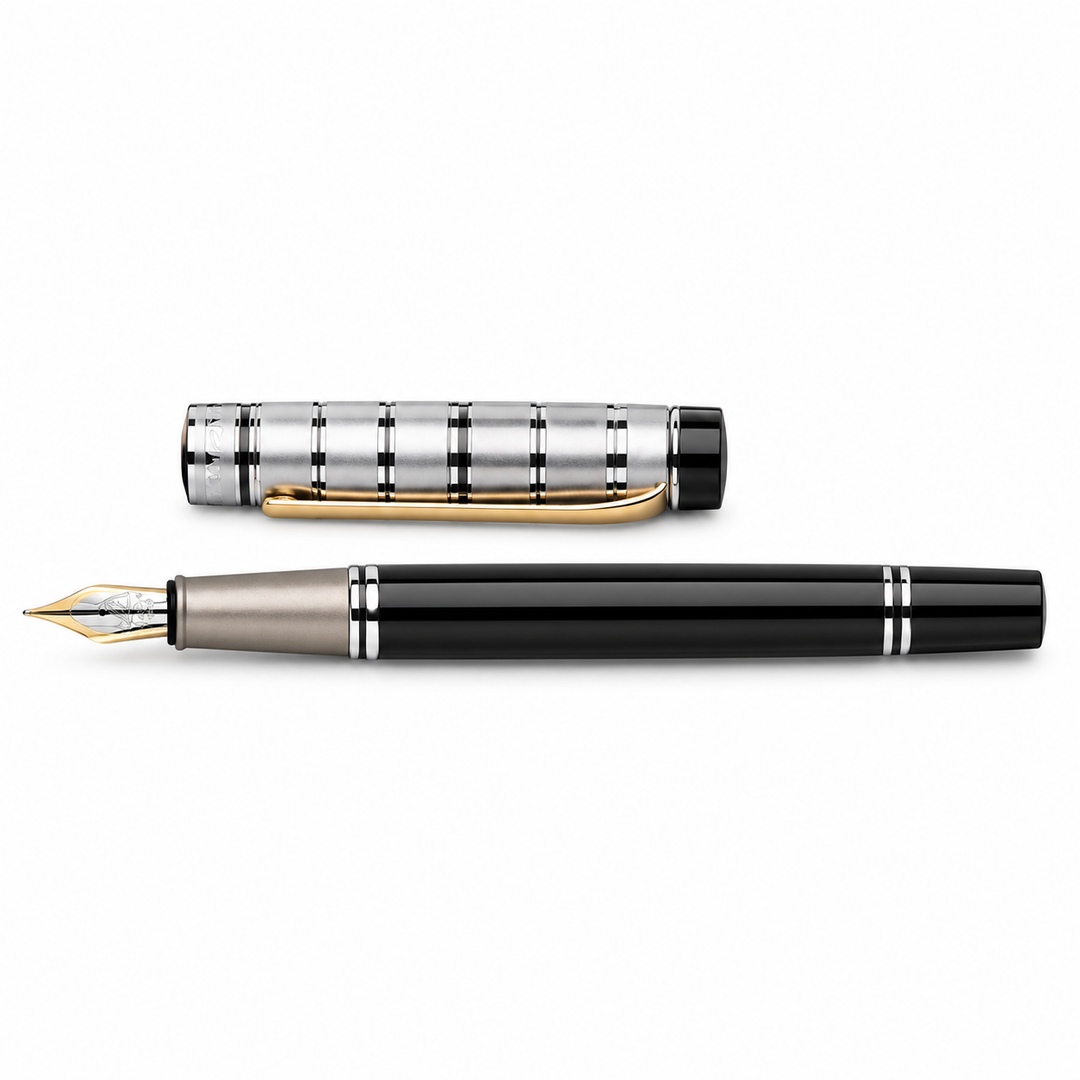 Silver Black fountain pen and matching cap arranged horizontally on white