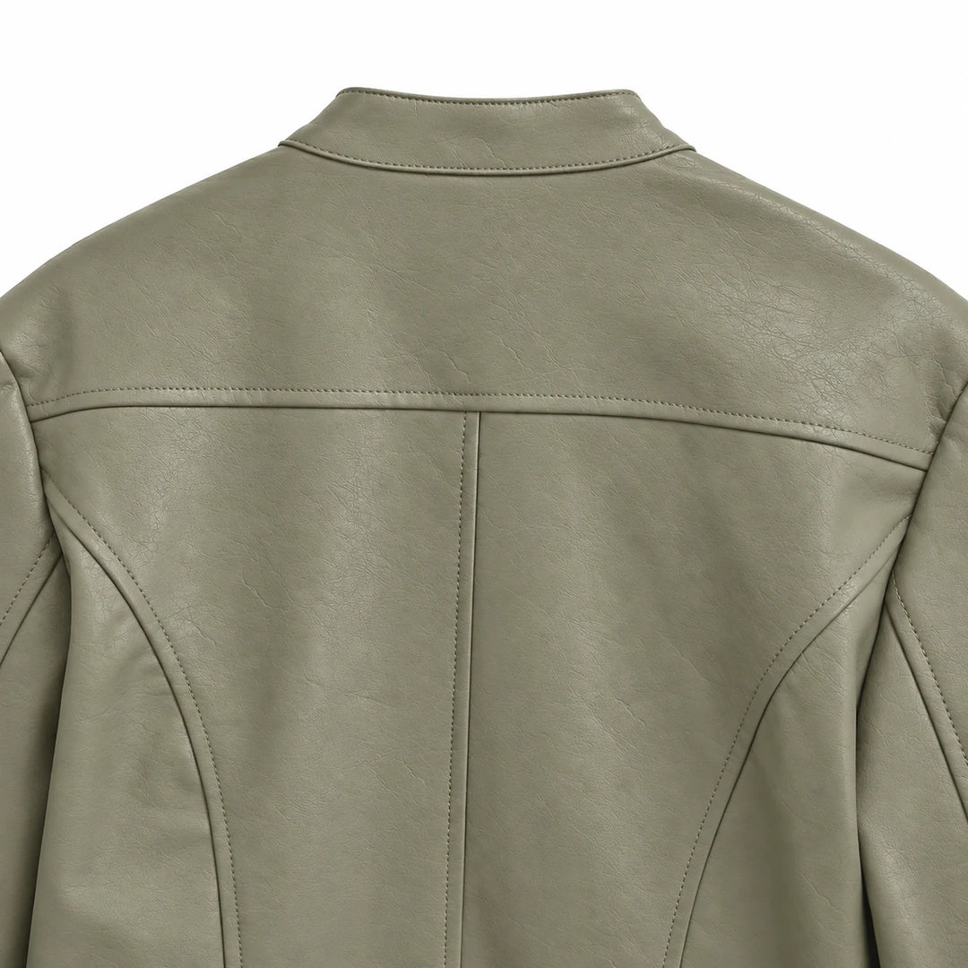 Gray Green jacket upper back showing the stand collar, with shoulder yoke, center seam and panel stitching in a white studio.