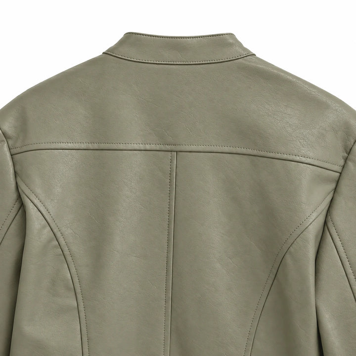 Gray Green jacket upper back showing the stand collar, with shoulder yoke, center seam and panel stitching in a white studio.