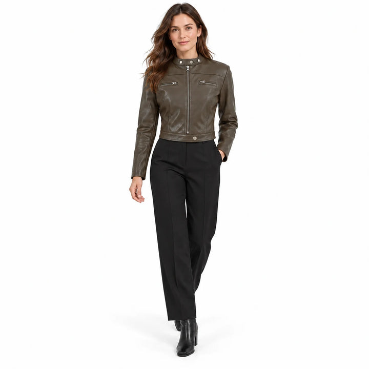 Coffee jacket worn by a brunette model in a walking pose, with black tailored trousers and ankle boots on a white background.
