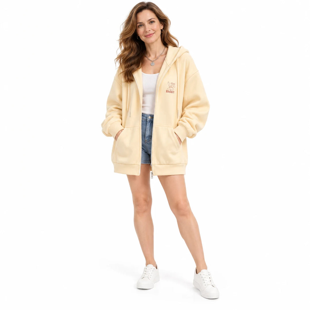 Apricot Yellow rabbit zip hoodie worn by an adult woman, with long sleeves and rabbit embroidery, against a white background.