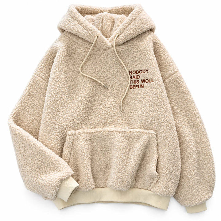Apricot fleece pullover shown in a front product view, with long sleeves and a kangaroo pocket, on a white studio background.