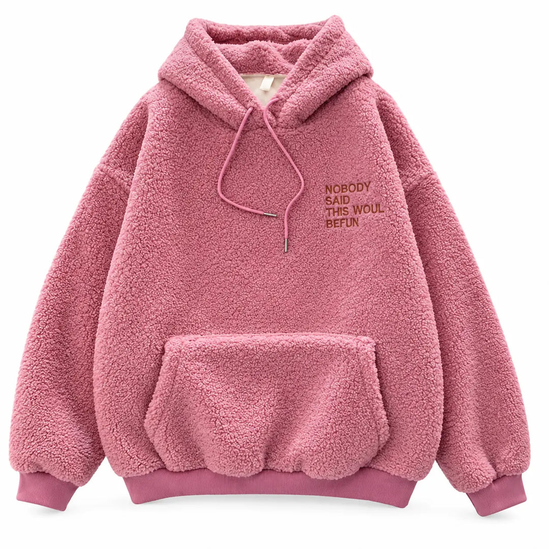 Pink fleece pullover shown in a front product view, showing the drawstring hood and front pocket, against a white background.