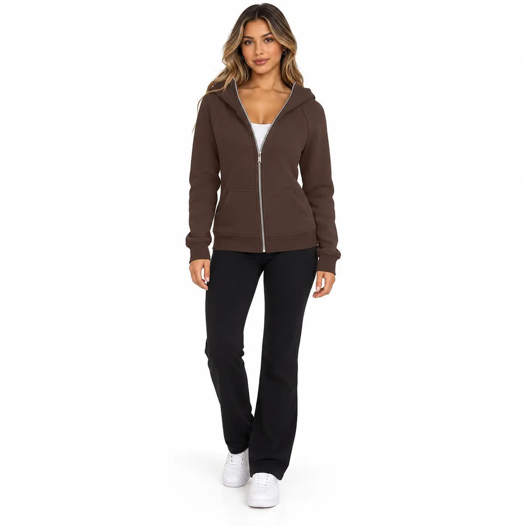 Full-body model wearing the Chocolate Brown zip hoodie, showing a front zipper, hood and ribbed cuffs, on a white background.