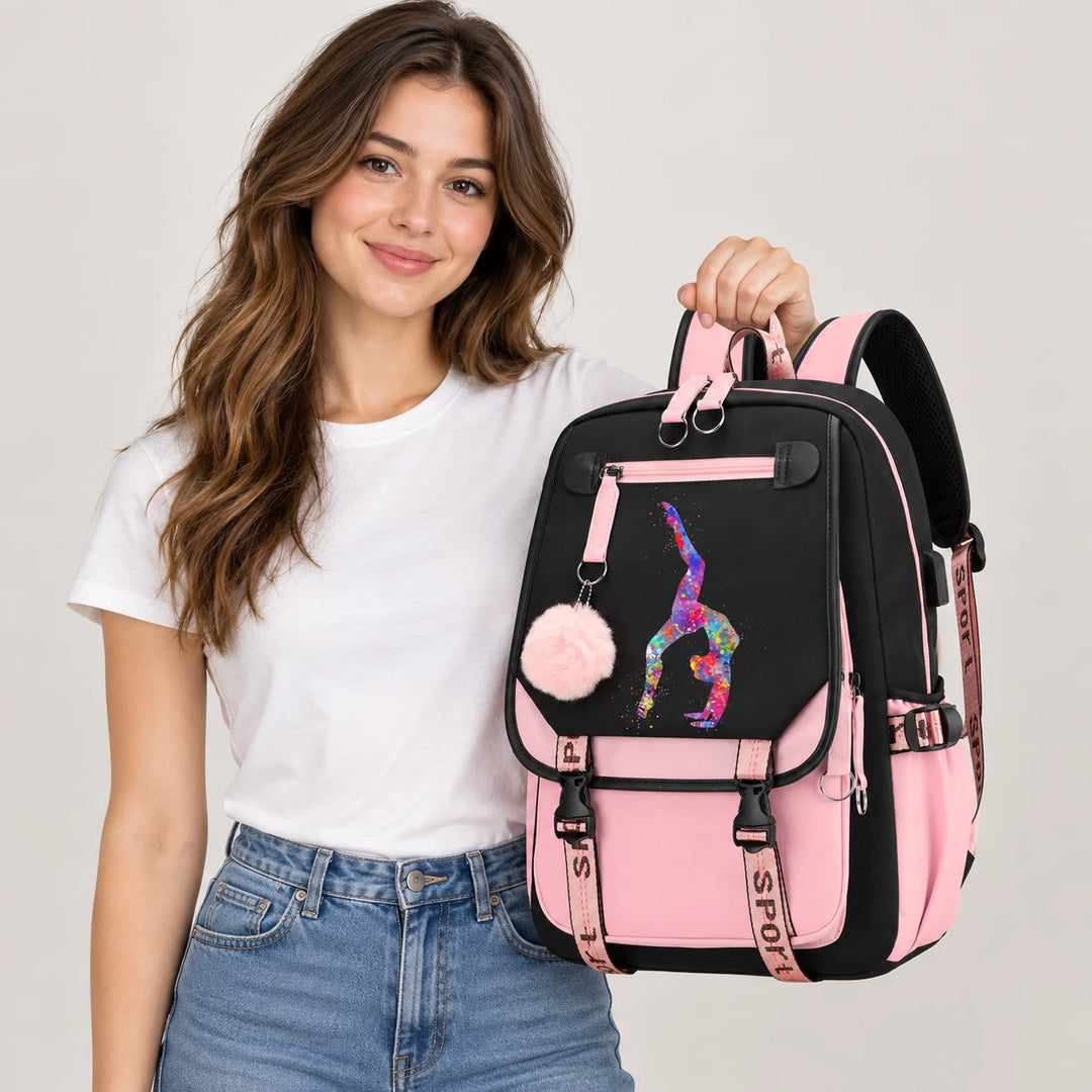 Adult model holding a pink and black gymnastics backpack with the watercolor handstand print, pink pendant and buckle straps.