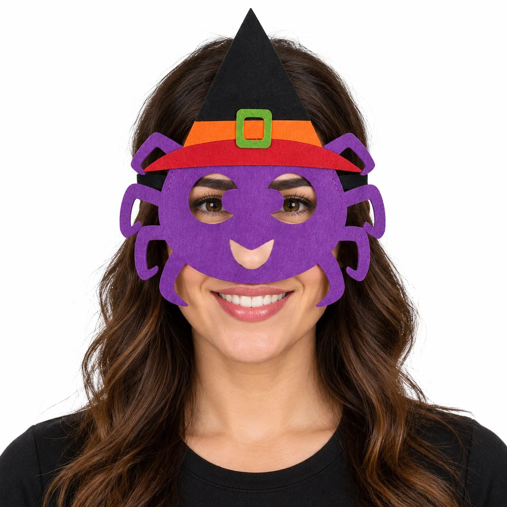 Adult woman wearing a purple spider felt mask with black pointed hat, orange band and green buckle against a white background