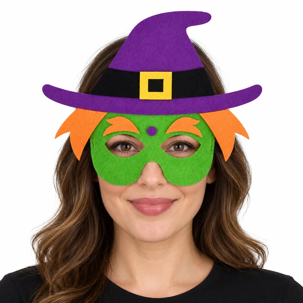 Adult woman wearing a green witch felt mask with orange hair, purple hat and yellow buckle photographed on a white background