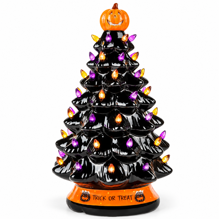 Lighted Halloween tree with an orange pumpkin topper, black tiers, purple and amber details and TRICK OR TREAT base on white.
