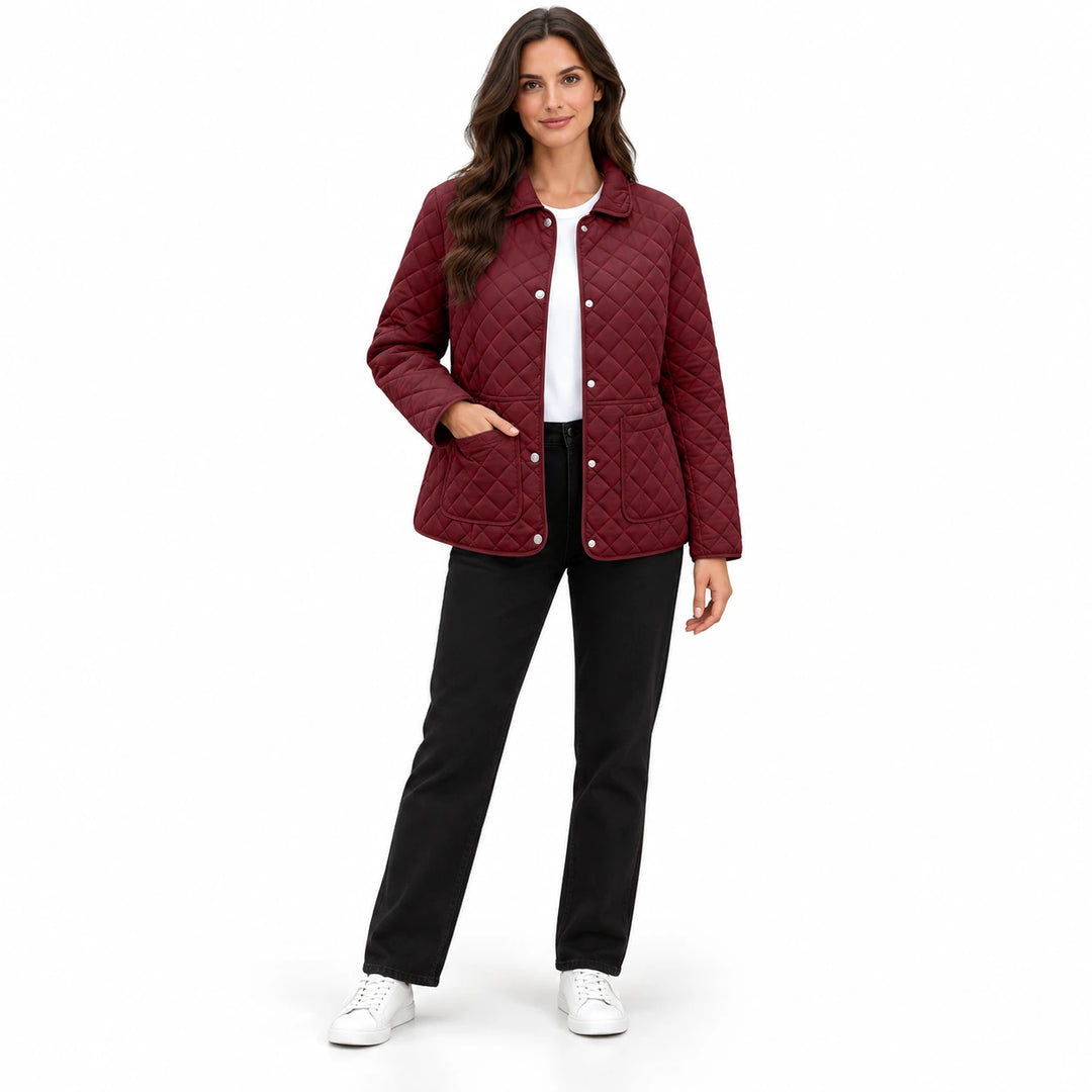 Wine Red quilted jacket on a full-body model wearing black trousers and white sneakers, showing the collar and front pockets.