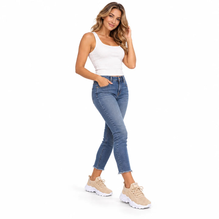 Khaki knit-textured lace-up sneakers worn by an adult model, three-quarter view on a white background