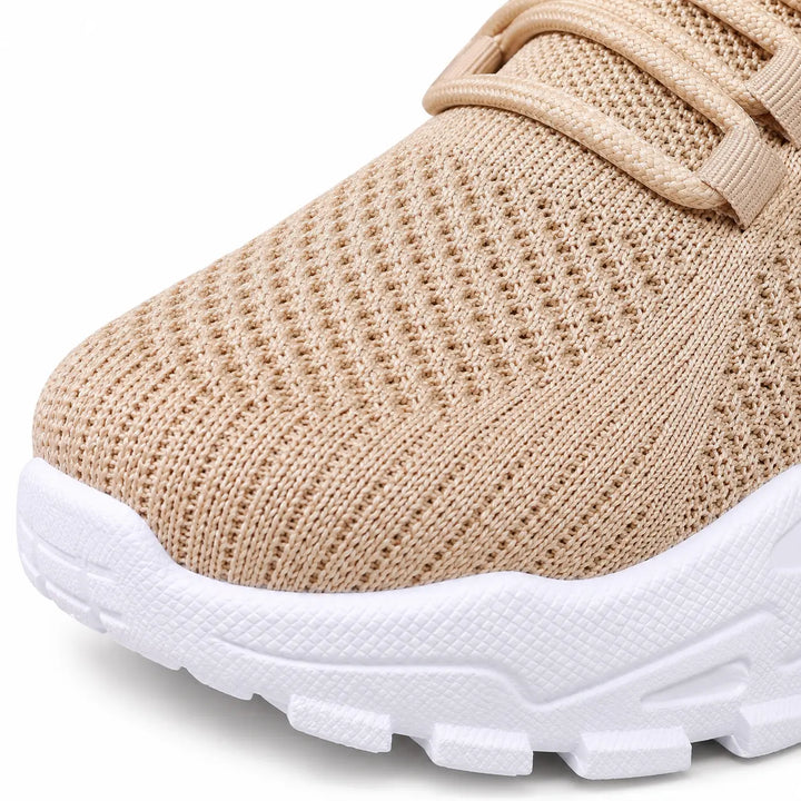 Close-up of Khaki shoe knit texture and its junction with the white sole
