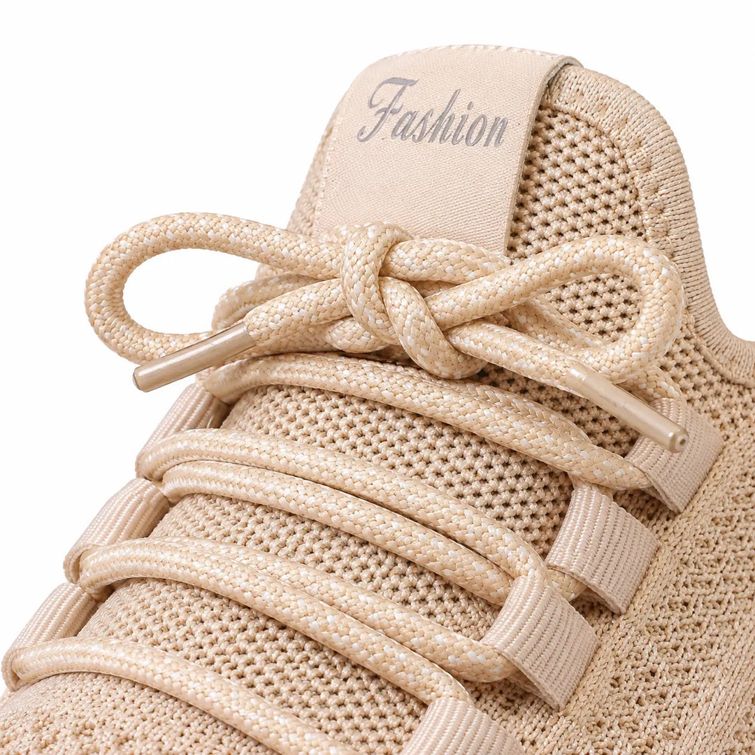 Close-up of Khaki laces, lace loops and the Fashion tongue label