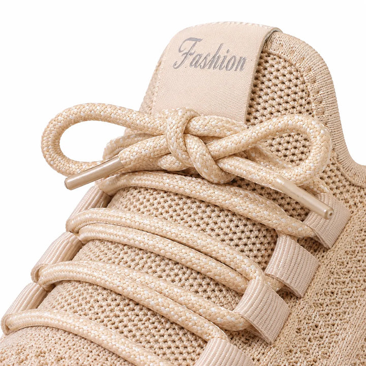 Close-up of Khaki laces, lace loops and the Fashion tongue label