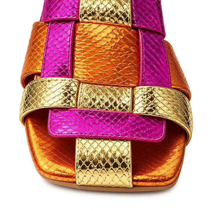 Close-up of the square toe edge and metallic strap intersection