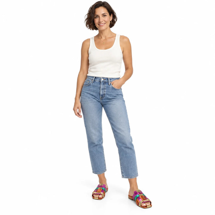 Multicolor metallic woven-strap slides worn by an adult model, second-model full-length view on a white background