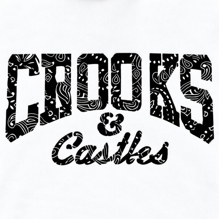 Close-up of black patterned chest lettering on the white hoodie