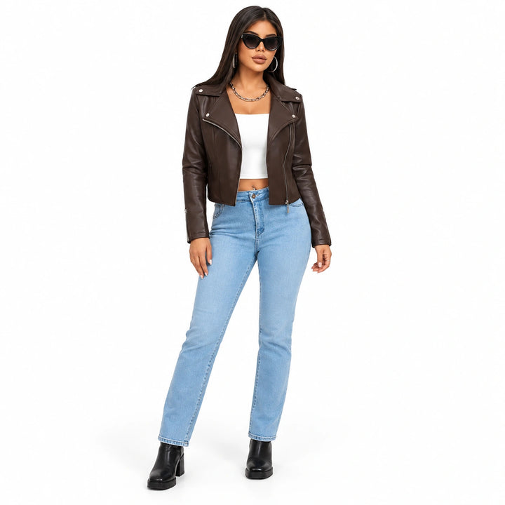 Cropped faux leather jacket in Chocolate Brown on a full-body model with blue jeans, showing the lapels and long sleeve look.