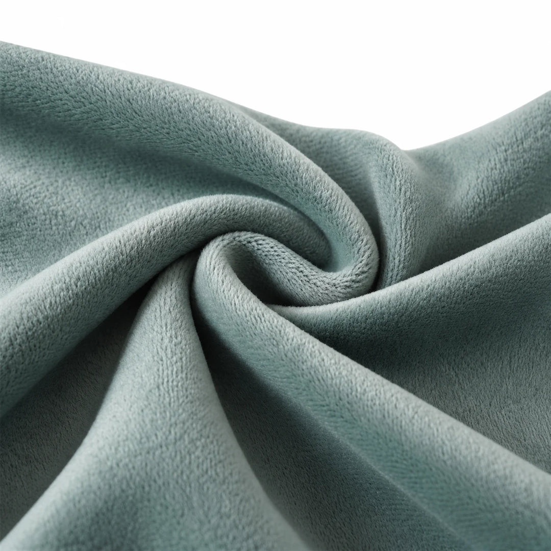 Close-up of the olive green sweatshirt fleece, showing the fabric surface and folds against white background without a model.