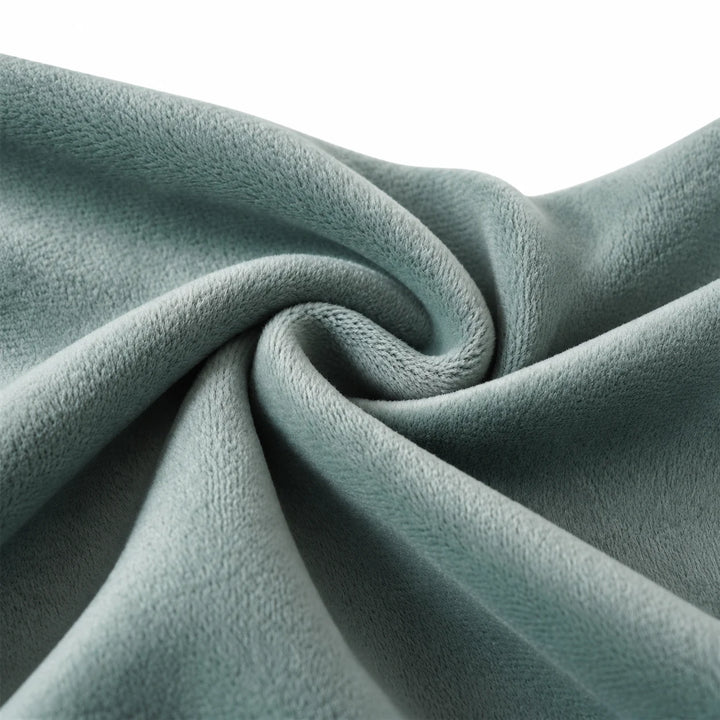 Close-up of the olive green sweatshirt fleece, showing the fabric surface and folds against white background without a model.